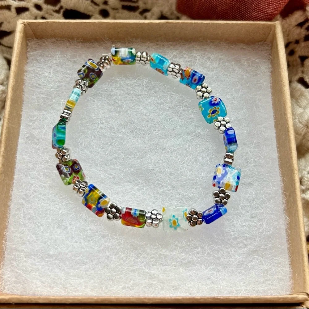 Millefiori glass beaded bracelet with silver‎ flower accents
